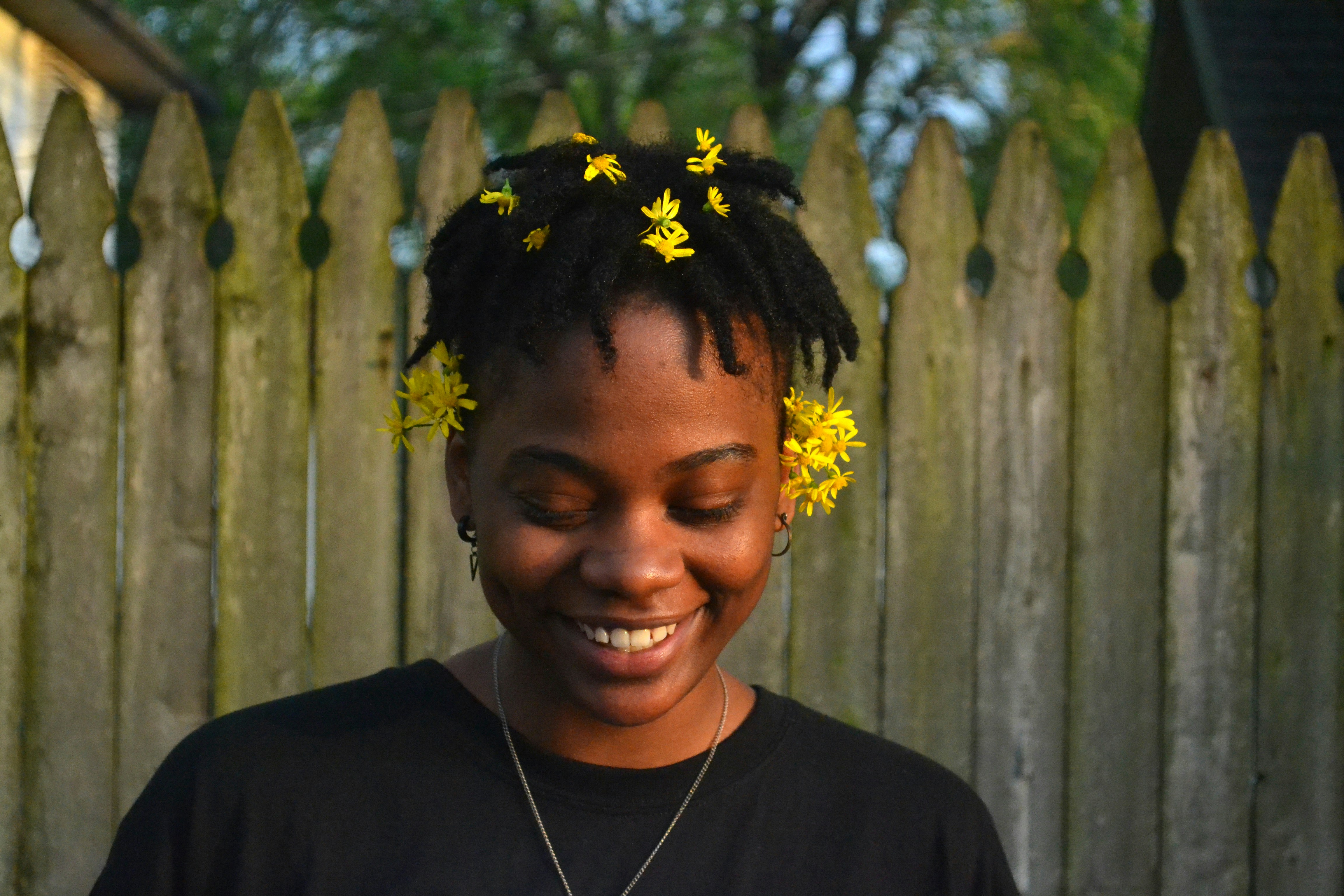 Young lady with flowers in hair.